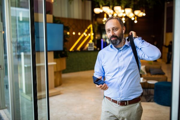 Businessman using a tablet shoulder holster