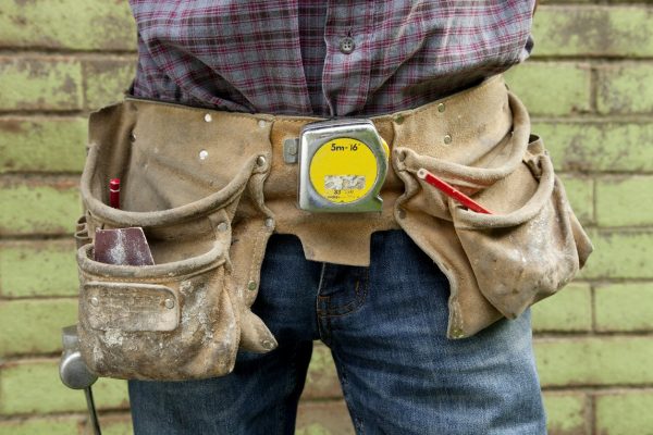 construction-worker-wearing-worn-out-belt-holster